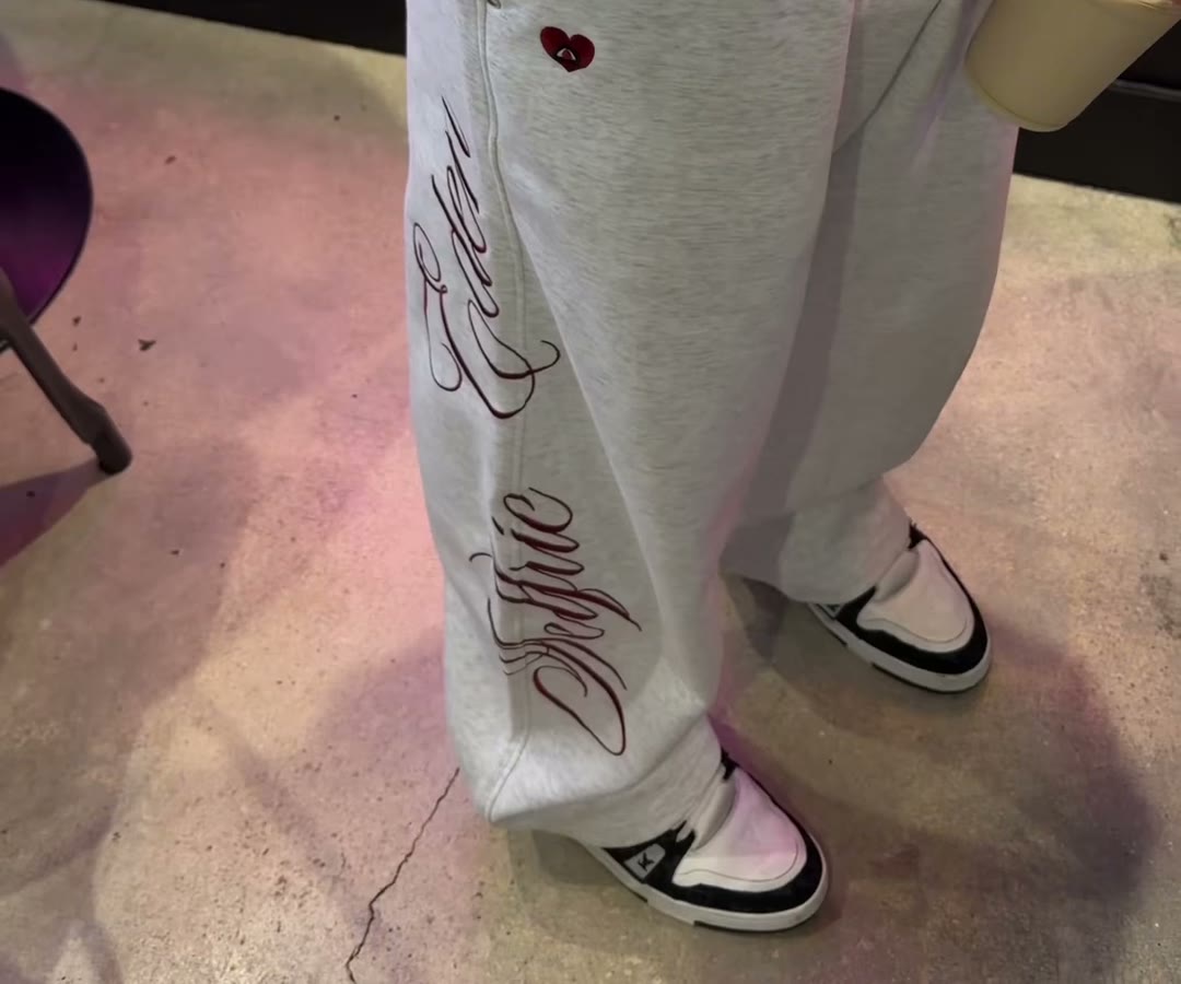 The pants have the same script (Aelfric Eden Boxy Embroidery Sweat Set, Zip Up Hoodie + Sweatpants, Grey, Aerely Chacón)