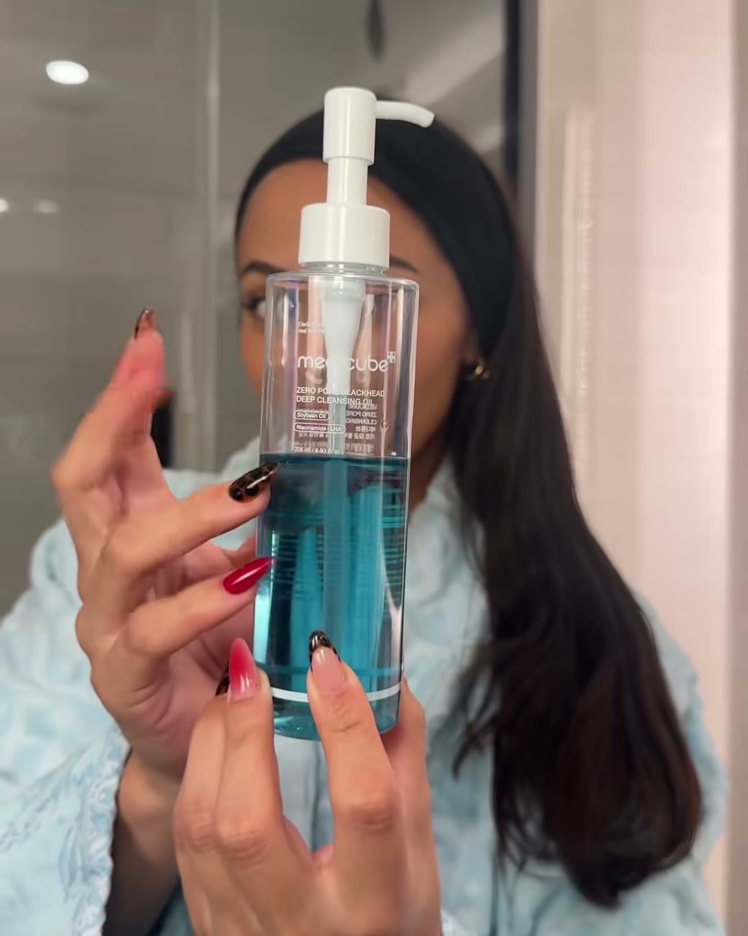 Step one. The blue oil goes on dry skin, before any water touches (medicube Zero Pore Double Cleansing Duo, Aerely Chacón)