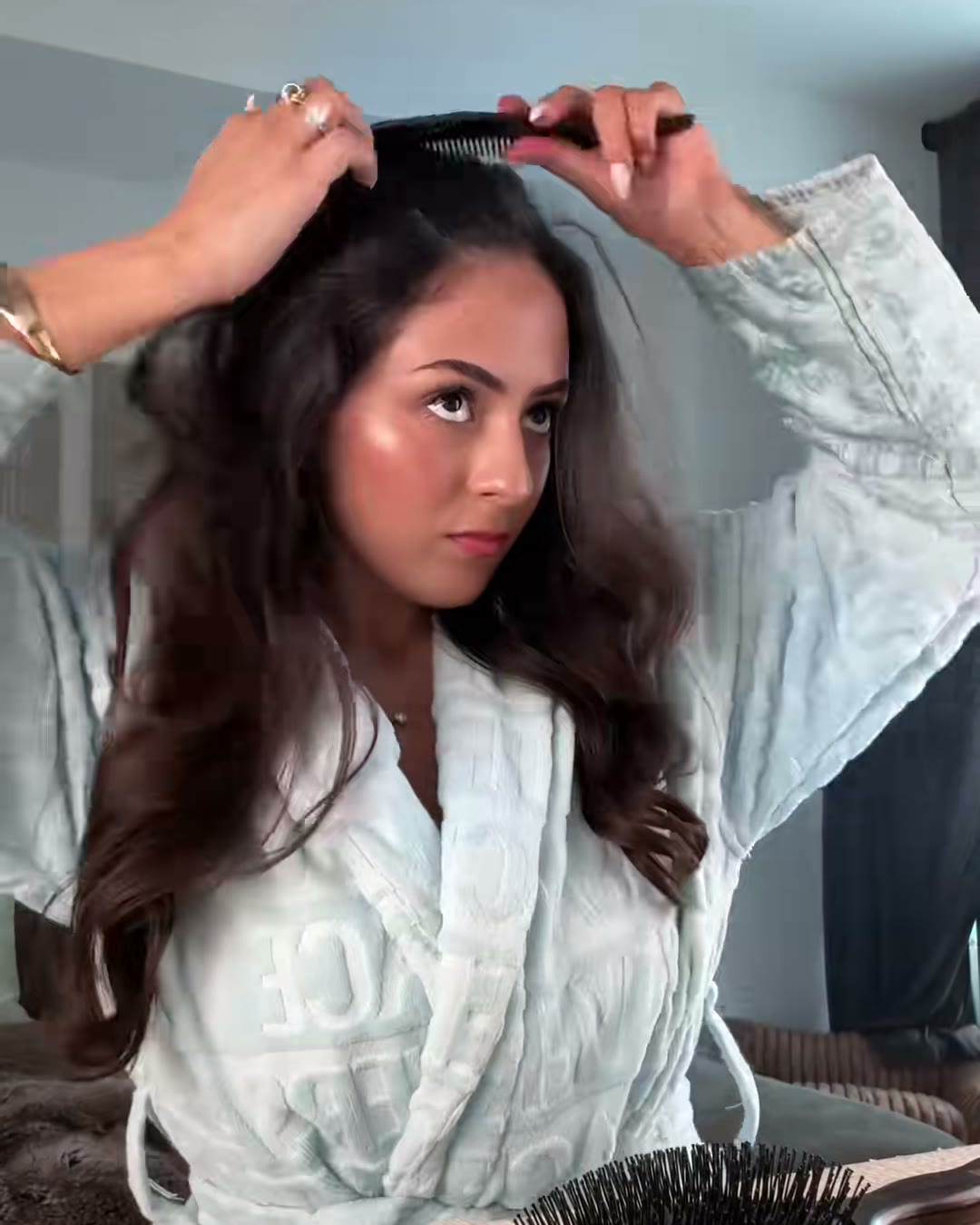 Sectioning off one piece at a time. This is the step everyone (COLOR WOW Style on Steroids Texturizing Spray, Aerely Chacón)