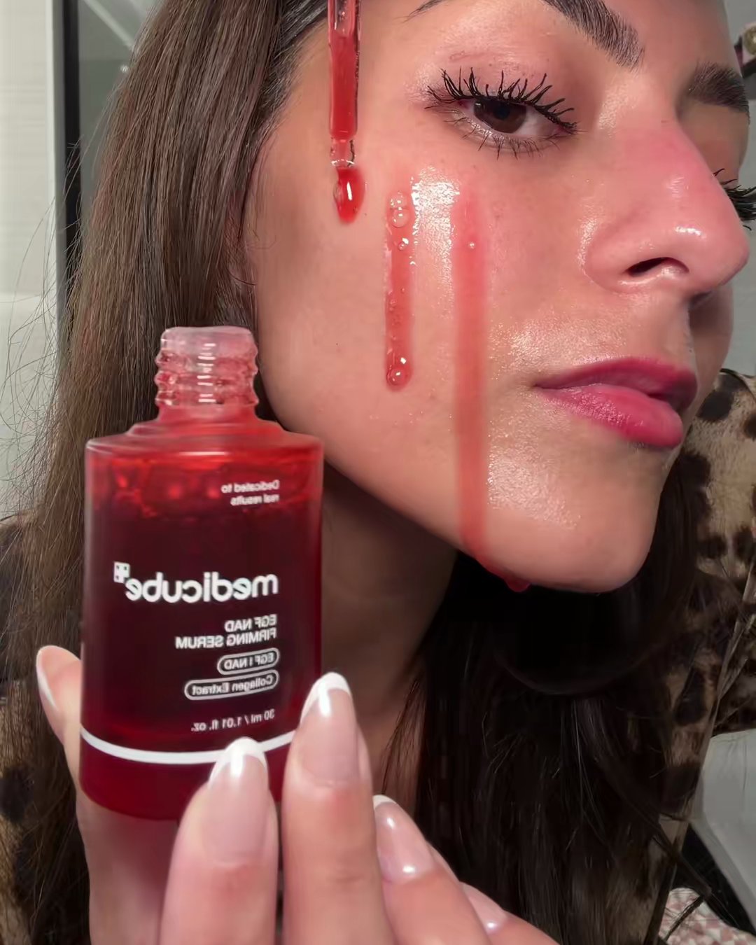The bottle from the video. Read the label: EGF NAD+ Firming. The pink (medicube EGF NAD+ Firming Serum, Aerely Chacón)