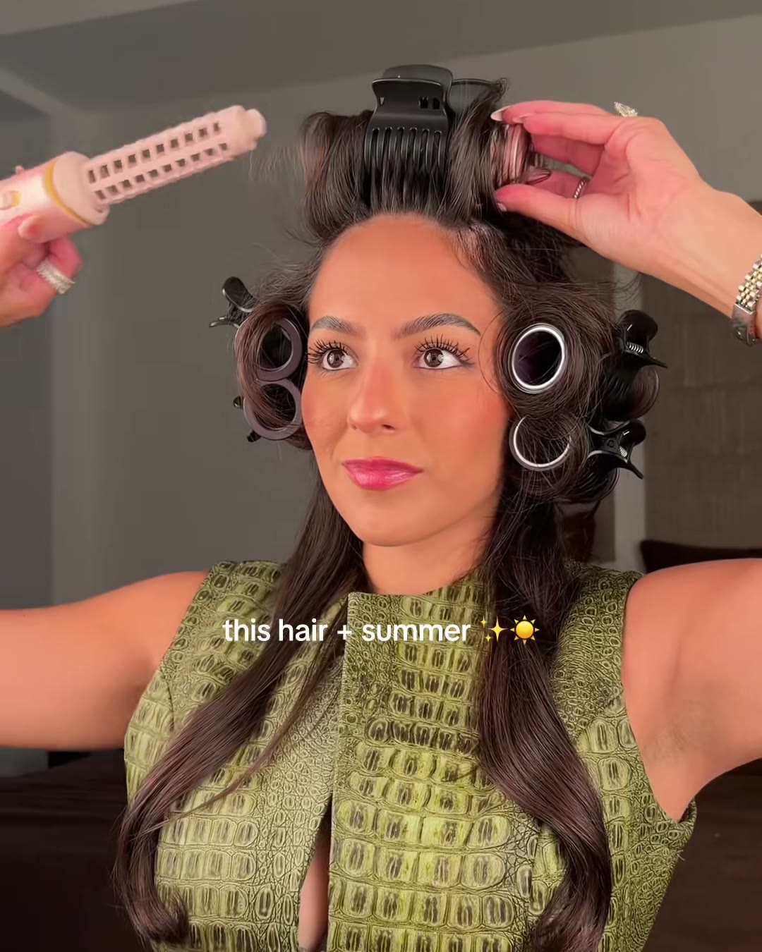 Two rollers straight up from the part, not swept back. Smaller (Wavytalk Airshape Pro Roller Air Styler Set, Aerely Chacón)